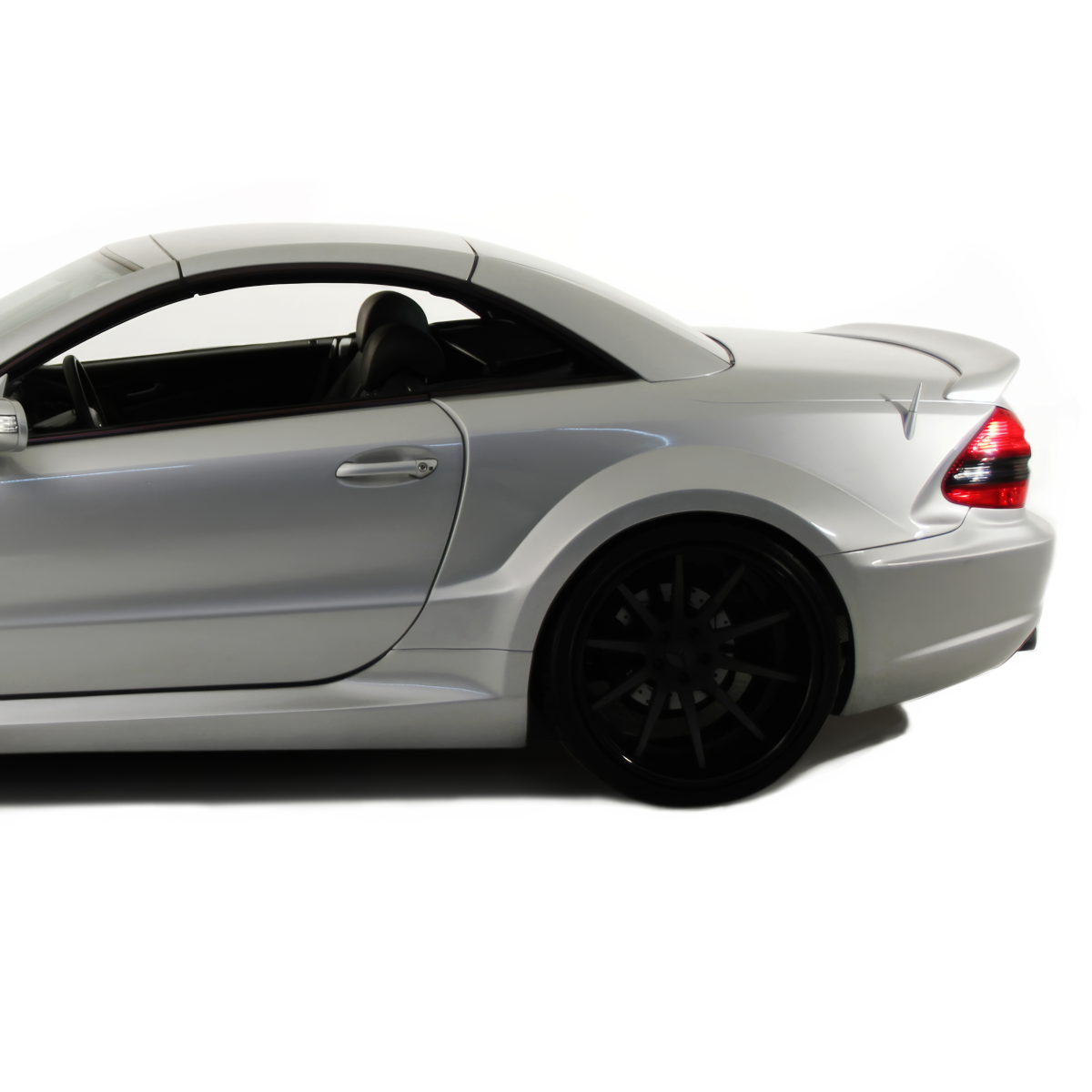 Modify your Mercedes-Benz SL-Class 2003 with our Exterior/Fenders - Side profile view of the vehicle at a slight angle