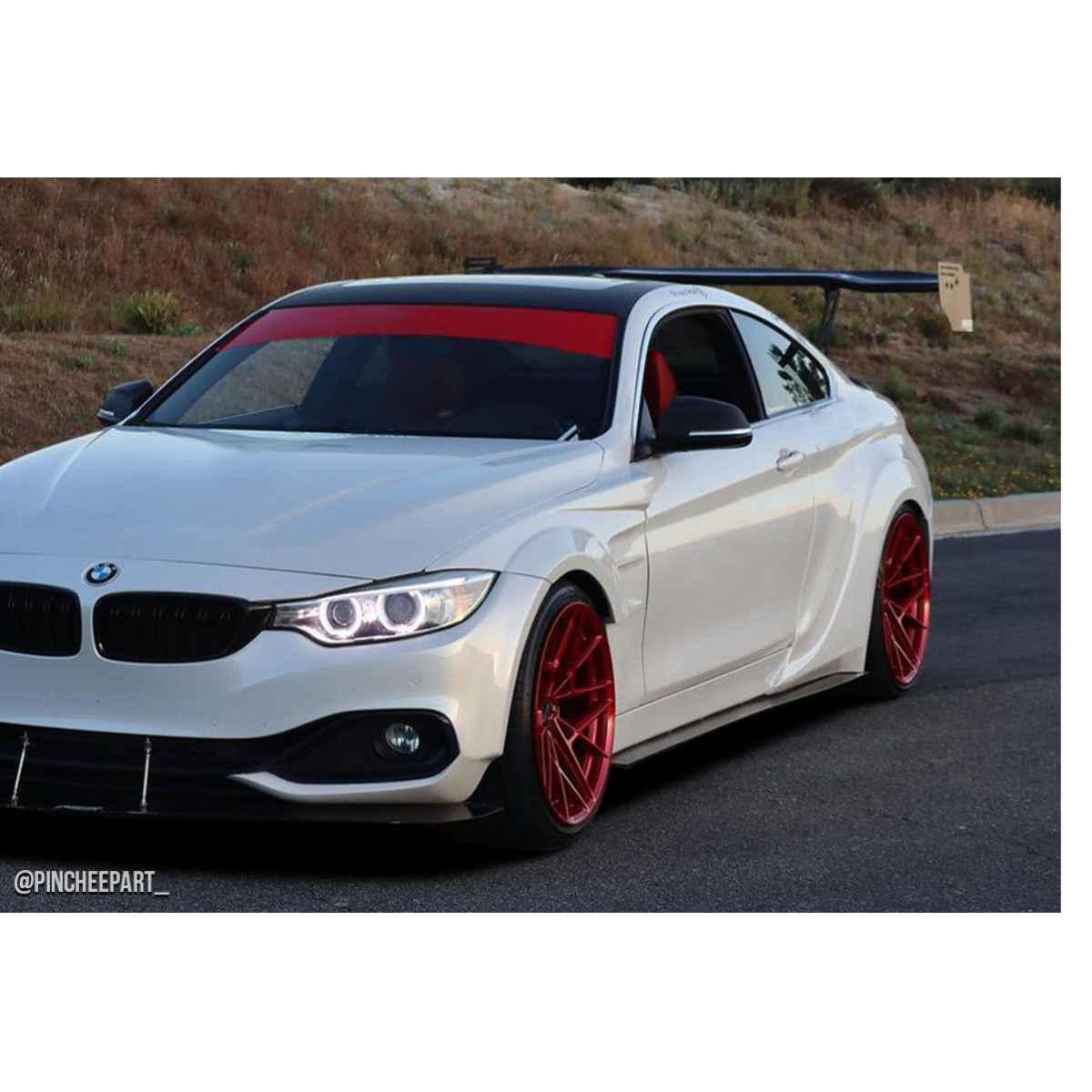 Modify your BMW 4-Series 2014 with our Exterior/Side Skirts - Front angle showcasing wide body side splitters