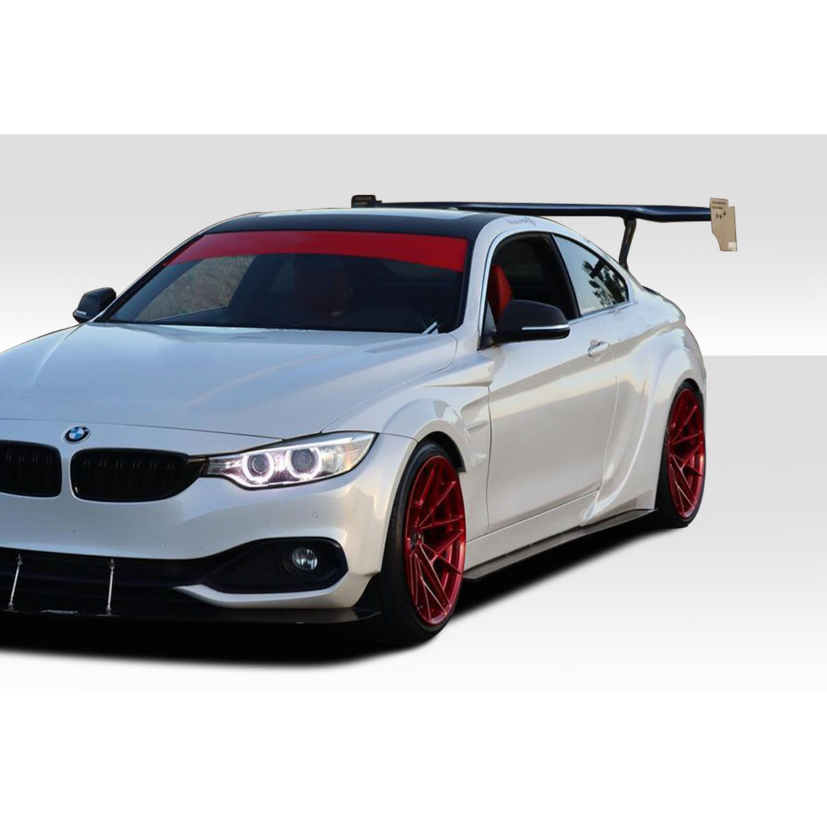 Modify your BMW 4-Series 2014 with our Exterior/Side Skirts - Front angle view of BMW 4 Series with modifications