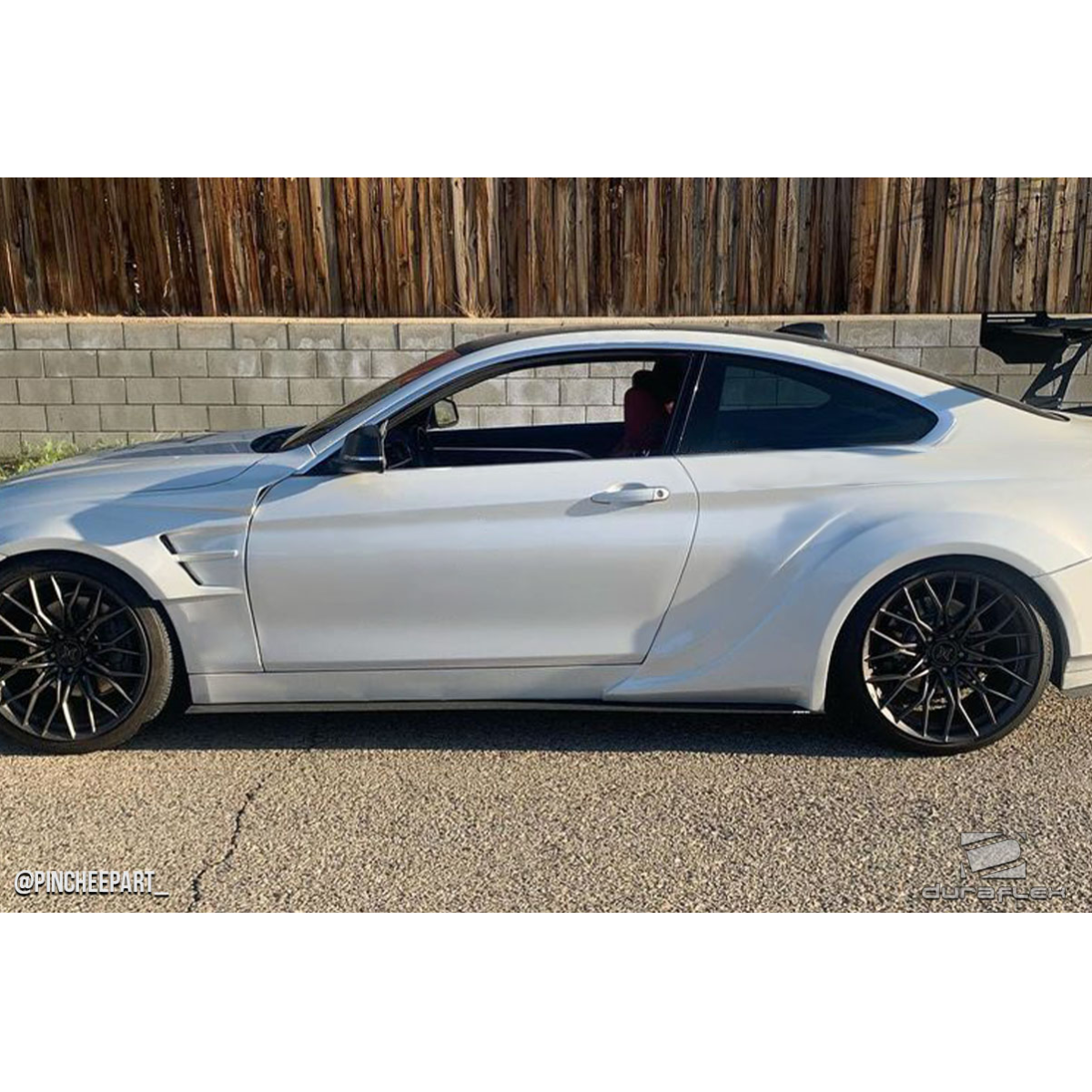 Modify your BMW 4-Series 2014 with our Exterior/Side Skirts - Side angle view of BMW 4 Series showing exterior parts