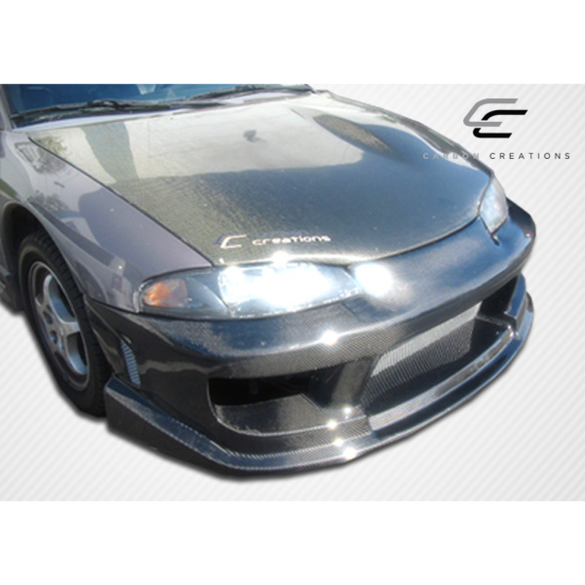 Modify your Eagle Talon 1995 with our Exterior/Hoods - Front angle view of carbon fiber hood