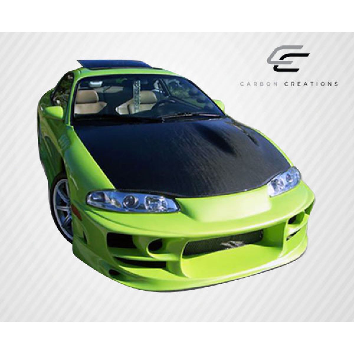 Modify your Eagle Talon 1995 with our Exterior/Hoods - Front angle view of the car part