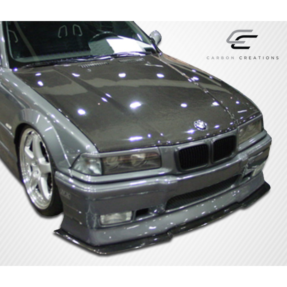 Modify your BMW 3-Series 1992 with our Exterior/Hoods - Front view of car part at slight angle