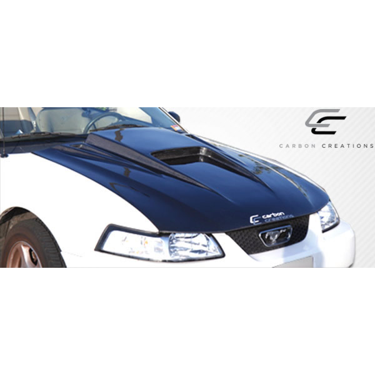 Modify your Ford Mustang 1999 with our Exterior/Hoods - Angled view from the front showing hood design