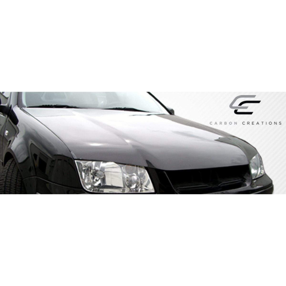 Modify your Volkswagen Jetta 1999 with our Exterior/Hoods - Slightly angled view of car front and hood