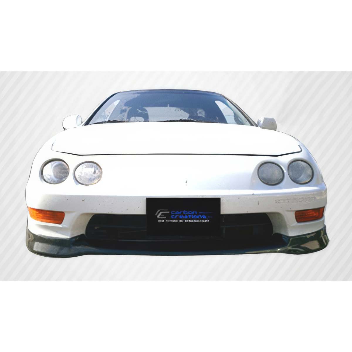 Modify your Acura Integra 1998 with our Exterior/Front Bumpers or Lips - Front view of the car showing bumper and lip