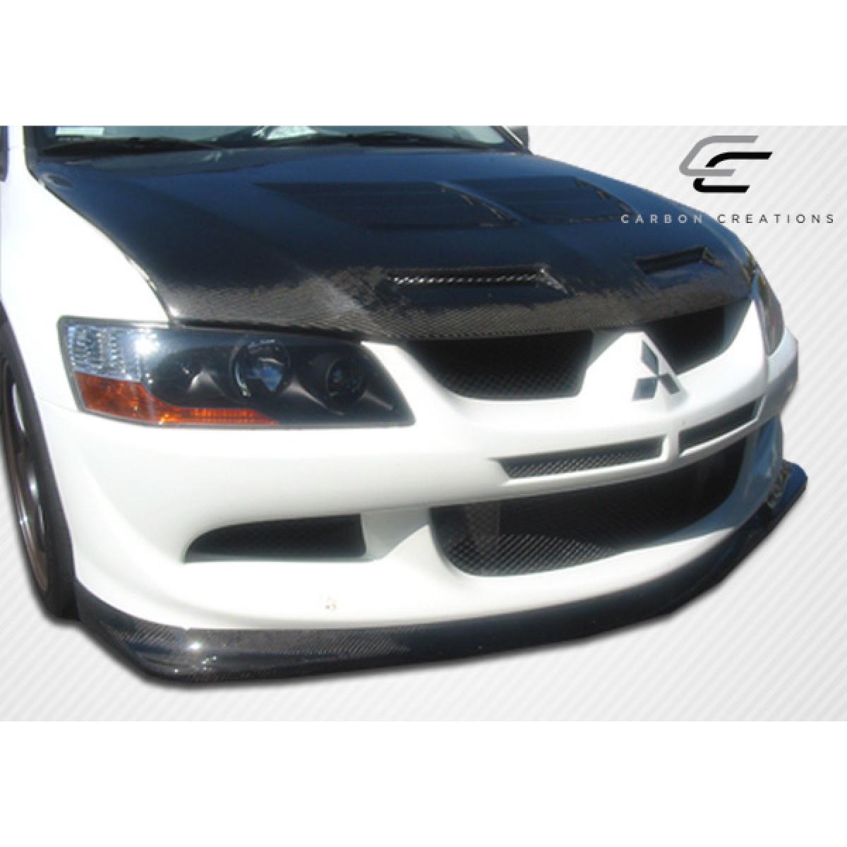 Modify your Mitsubishi Evolution 2003 with our Exterior/Front Bumpers or Lips - Front view at a slight angle from above