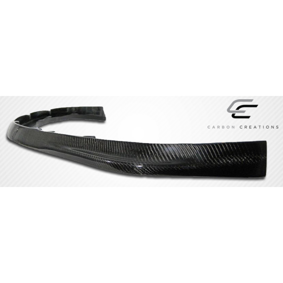 Modify your Mitsubishi Evolution 2003 with our Exterior/Front Bumpers or Lips - Side angle view of a carbon fiber front lip