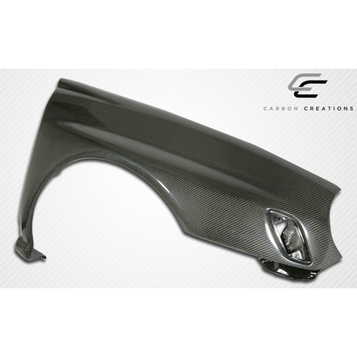 Modify your Subaru Impreza 2002 with our Exterior/Fenders - Angled view showcasing carbon fiber fender design