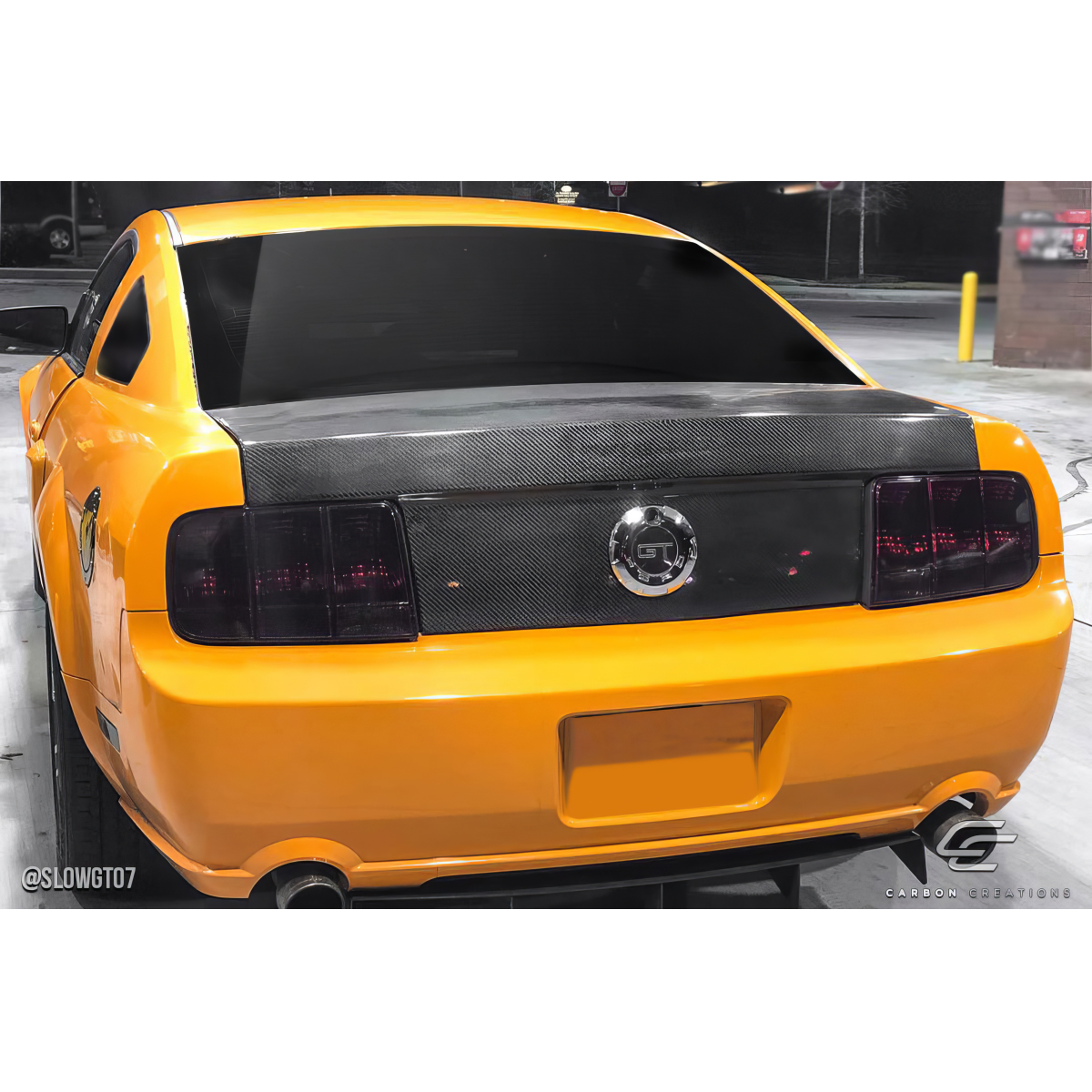 Modify your Ford Mustang 2005 with our Exterior/Trunks - Image shows rear view of vehicle at a slight angle