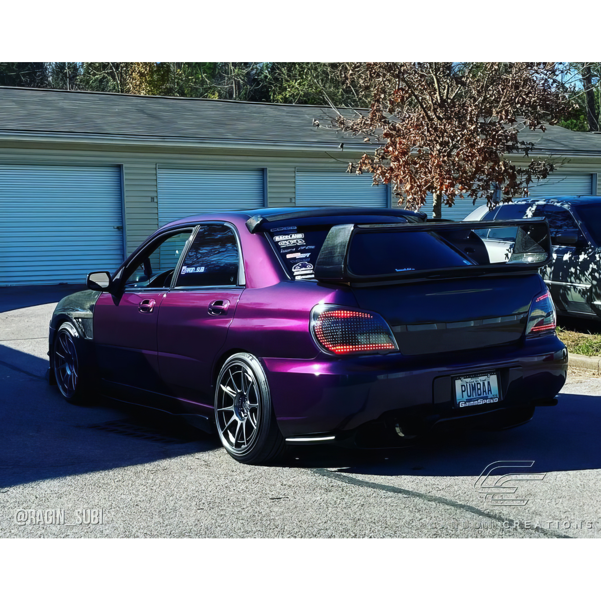 Modify your Subaru Impreza 2002 with our Exterior/Wings - Rear three quarter angle view of vehicle