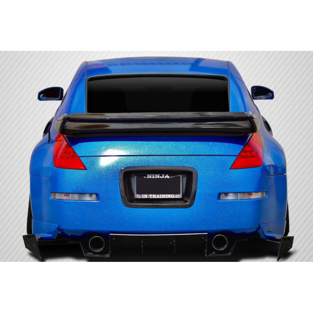 Modify your Nissan 350Z 2003 with our Exterior/Wings - Rear view angle of the Nissan 350Z vehicle