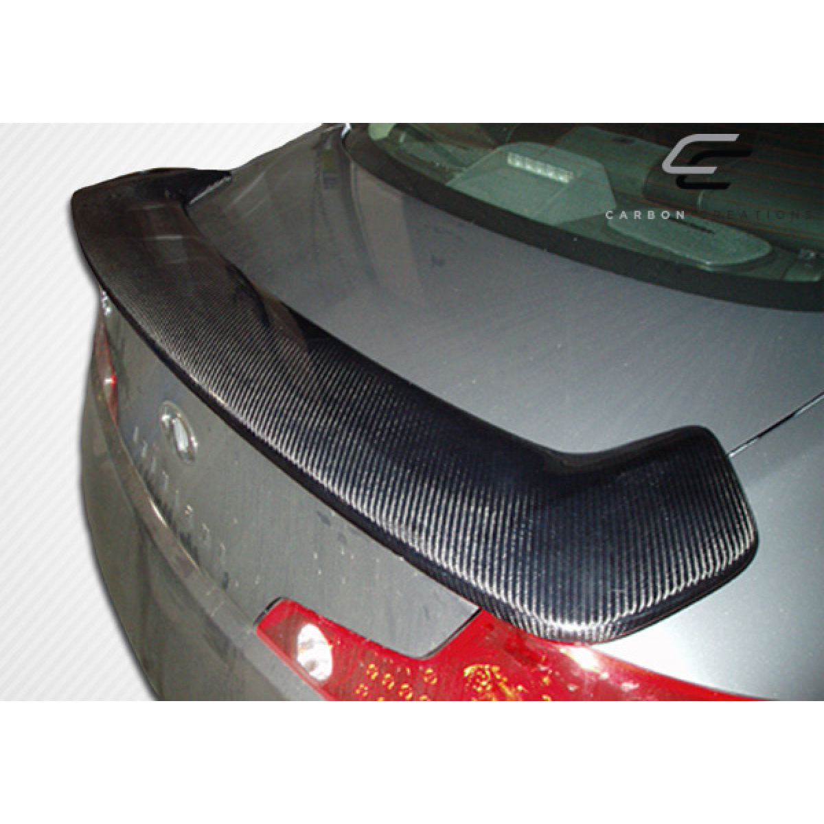 Modify your Infiniti G35 2003 with our Exterior/Wings - Angle shows top view of rear trunk lid spoiler