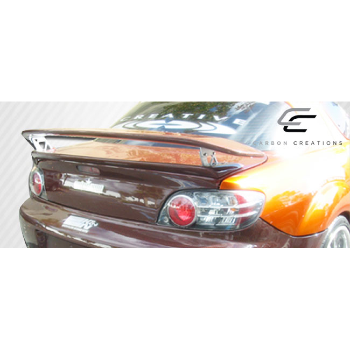 Modify your Mazda RX-8 2004 with our Exterior/Wings - Viewed from the rear at a slight angle