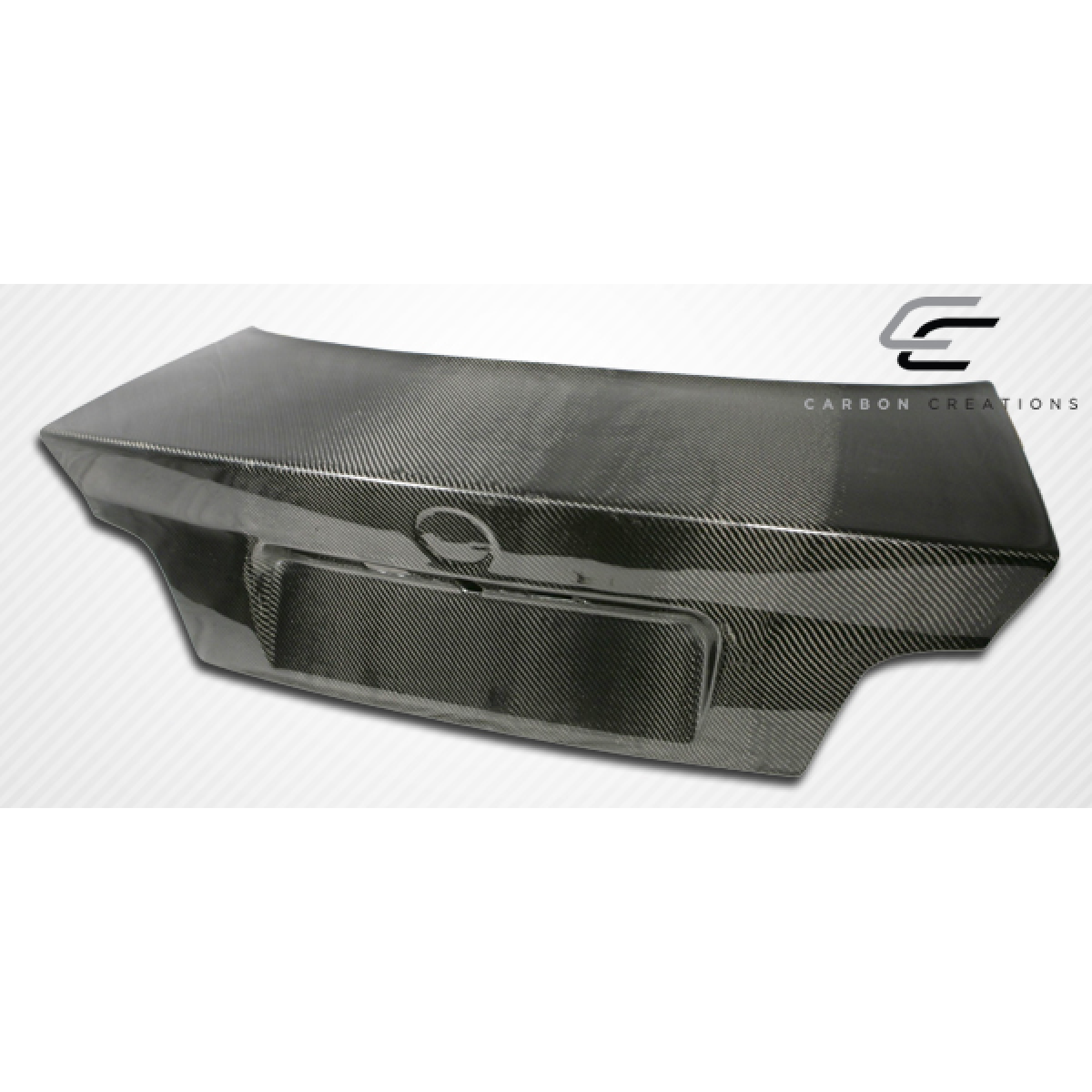 Modify your BMW 3-Series 1992 with our Exterior/Trunks - Angled top view showing carbon fiber texture