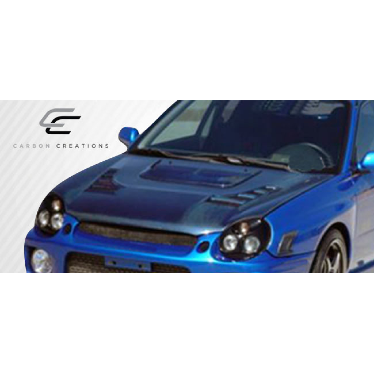 Modify your Subaru Impreza 2002 with our Exterior/Hoods - Front angle view of a modified blue impreza