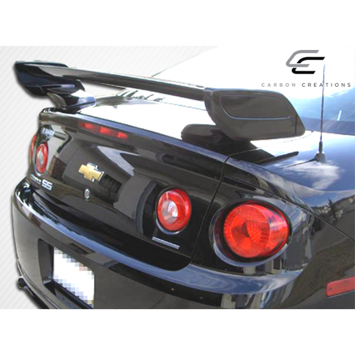 Modify your Chevrolet Cobalt 2005 with our Exterior/Wings - Rear angle showing wing and tail lights