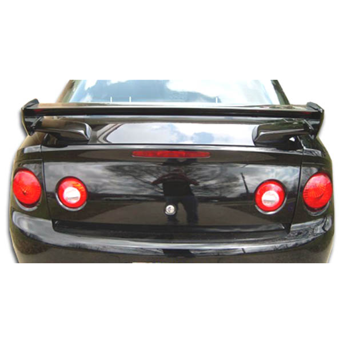 Modify your Chevrolet Cobalt 2005 with our Exterior/Wings - Rear view of a car at a slight angle