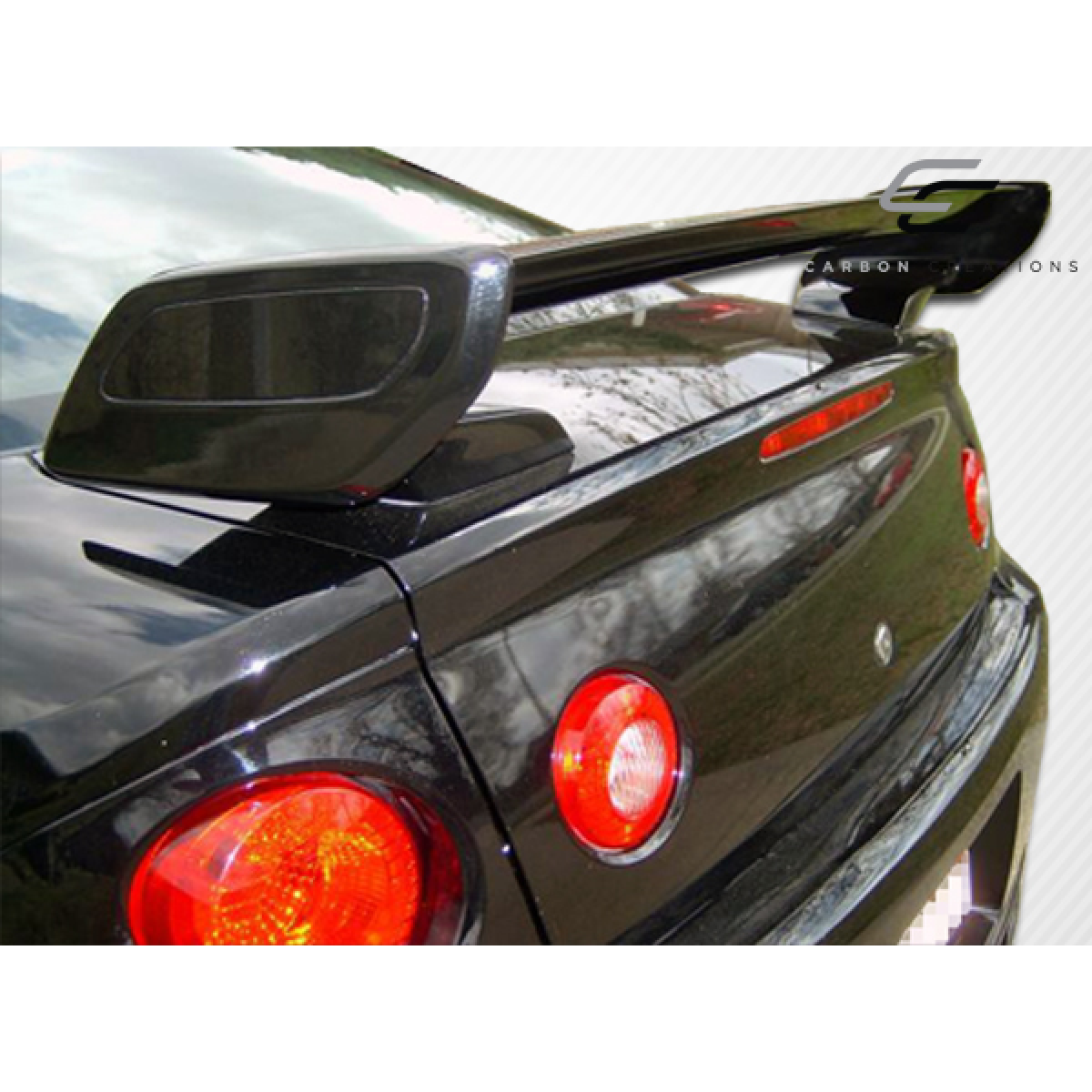 Modify your Chevrolet Cobalt 2005 with our Exterior/Wings - View from slightly above and behind the car