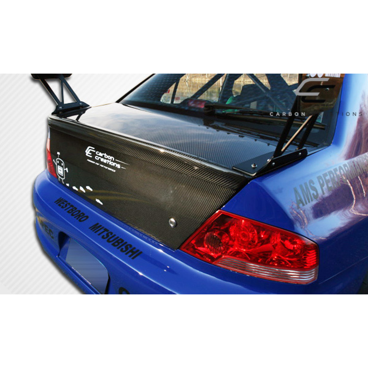 Modify your Mitsubishi Evolution 2002 with our Exterior/Trunks - Rear view of trunk lid at a slight angle