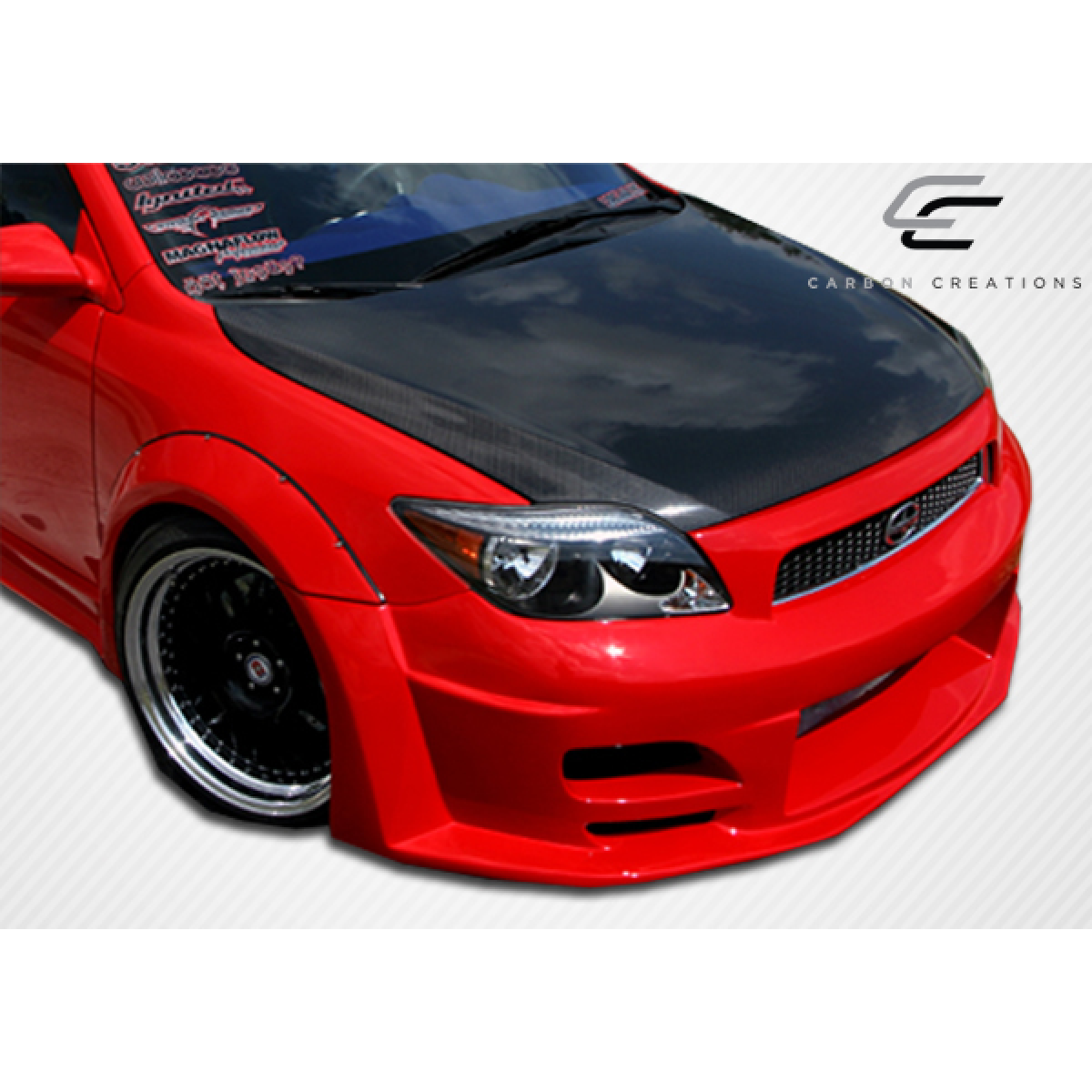 Modify your Scion tC 2005 with our Exterior/Hoods - Angled view showing car hood and front design