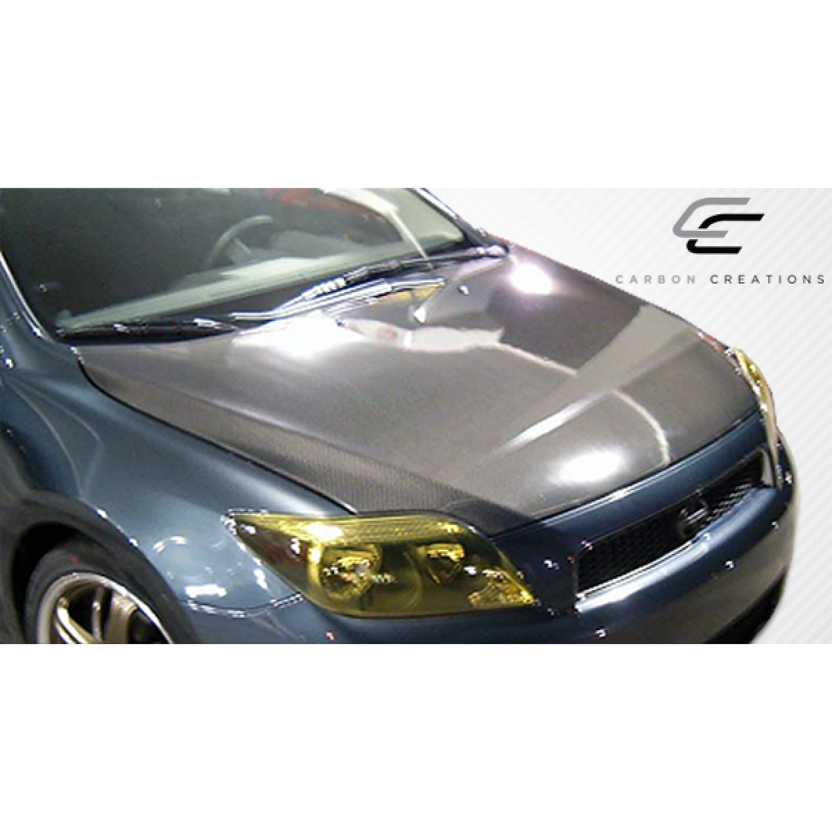 Modify your Scion tC 2005 with our Exterior/Hoods - Viewed from slightly elevated angle