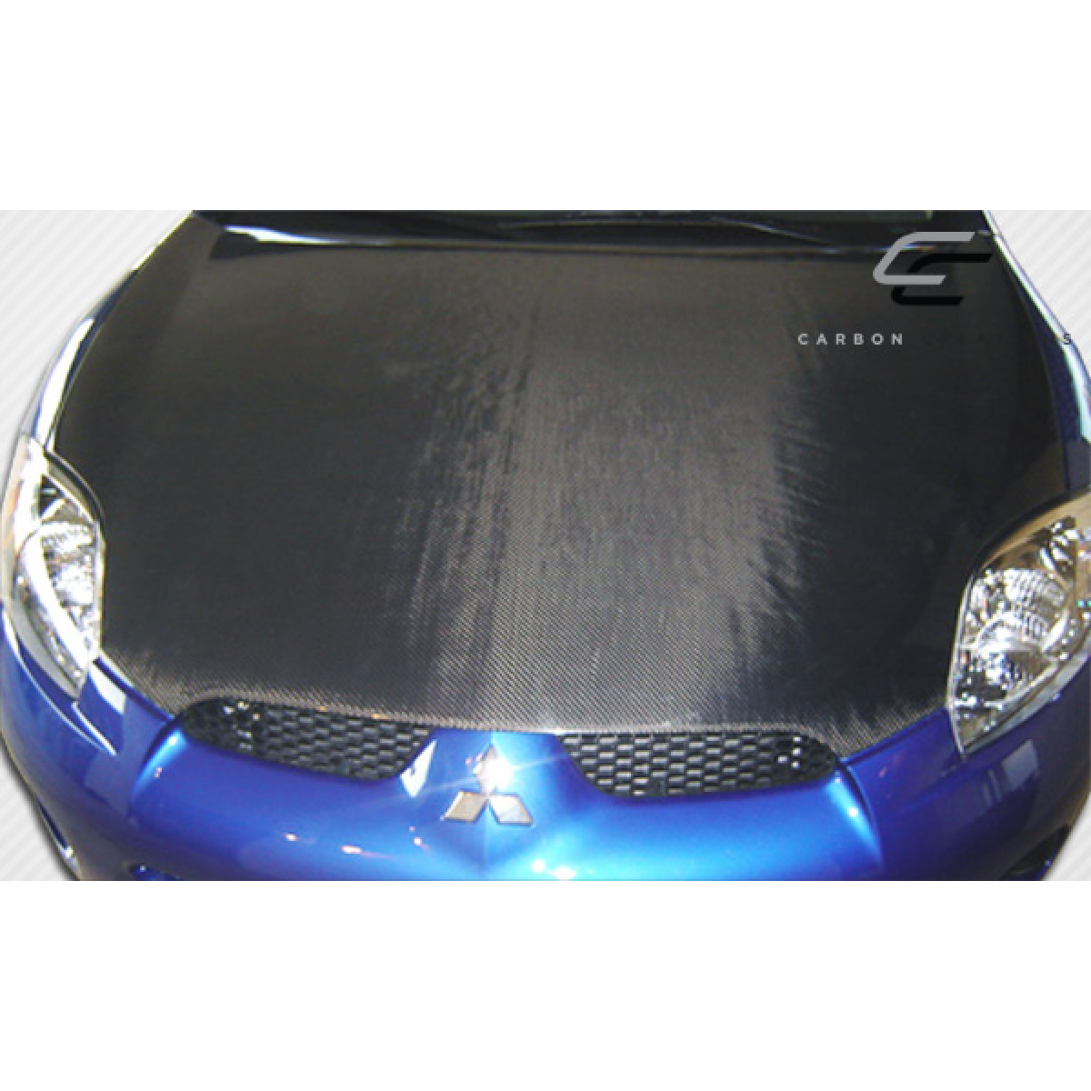 Modify your Mitsubishi Eclipse 2006 with our Exterior/Hoods - Top down view of carbon fiber hood on vehicle