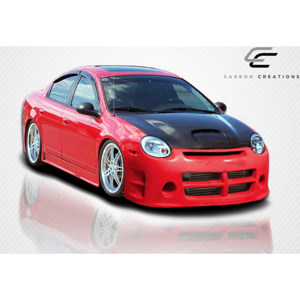 Modify your Dodge Neon 2000 with our Exterior/Hoods - Front three quarter angle view of a car
