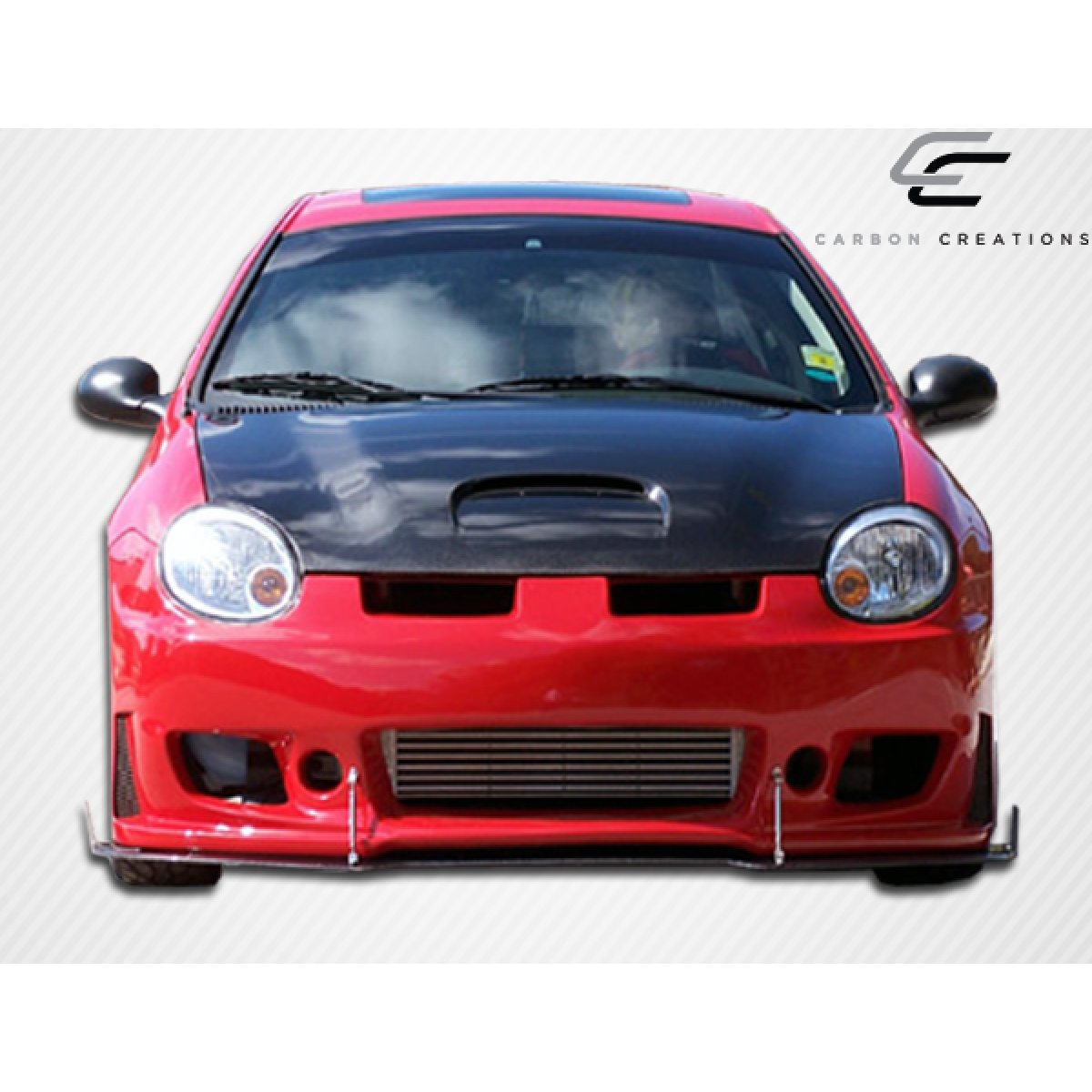 Modify your Dodge Neon 2000 with our Exterior/Hoods - Front view of a modified Dodge Neon car