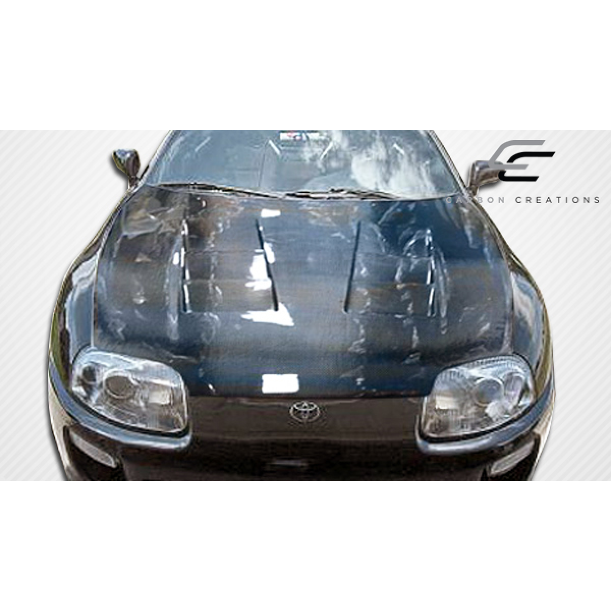 Modify your Toyota Supra 1993 with our Exterior/Hoods - View from the front at a slight angle