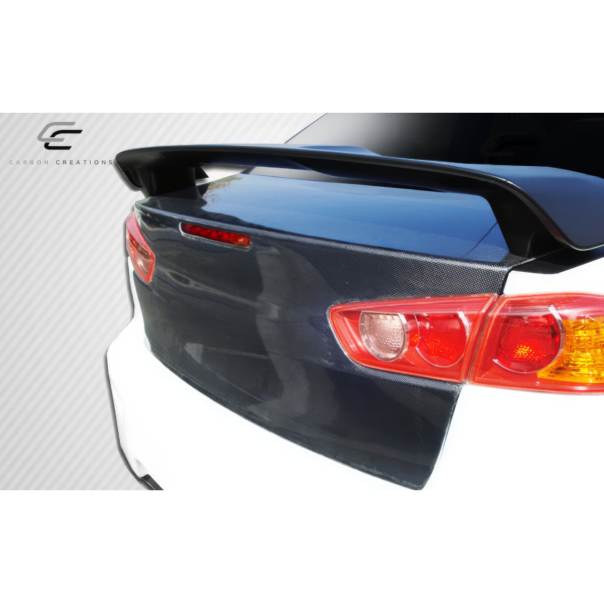 Modify your Mitsubishi Evolution 2008 with our Exterior/Trunks - Rear view at a slight angle showing trunk and spoiler