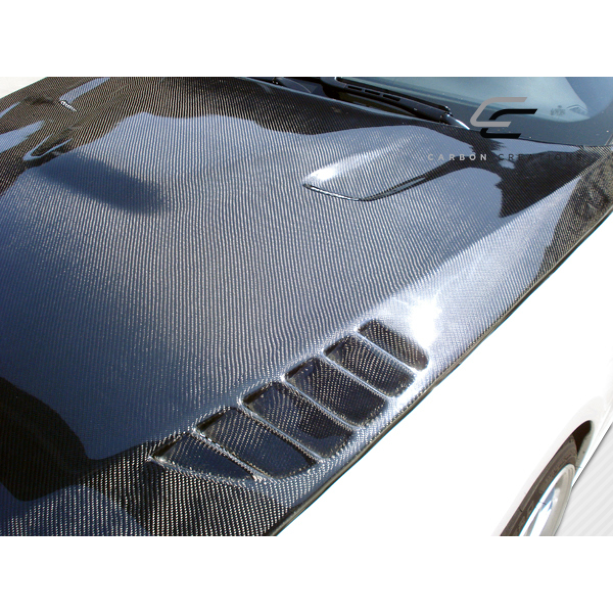 Modify your BMW 3-Series 2007 with our Exterior/Hoods - Hood viewed from a slight top angle