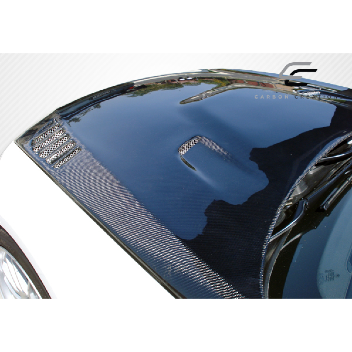 Modify your BMW 3-Series 2007 with our Exterior/Hoods - Top angled view of carbon fiber hood
