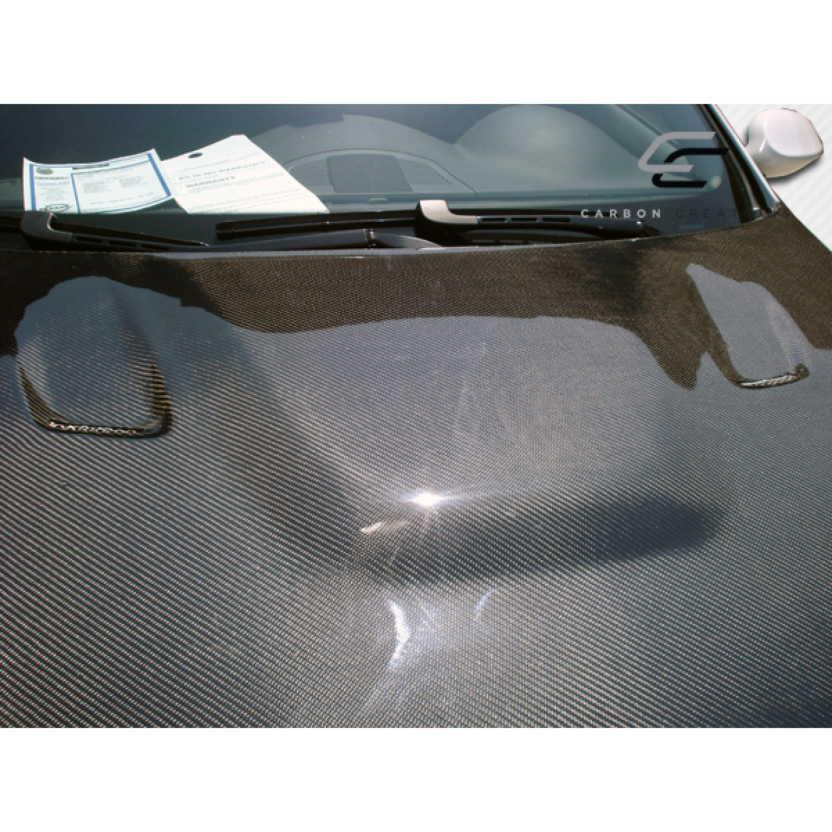 Modify your BMW 3-Series 2007 with our Exterior/Hoods - Top down angle showing carbon fiber hood