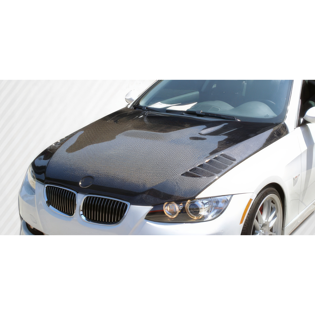Modify your BMW 3-Series 2007 with our Exterior/Hoods - Top view angle showing carbon fiber hood