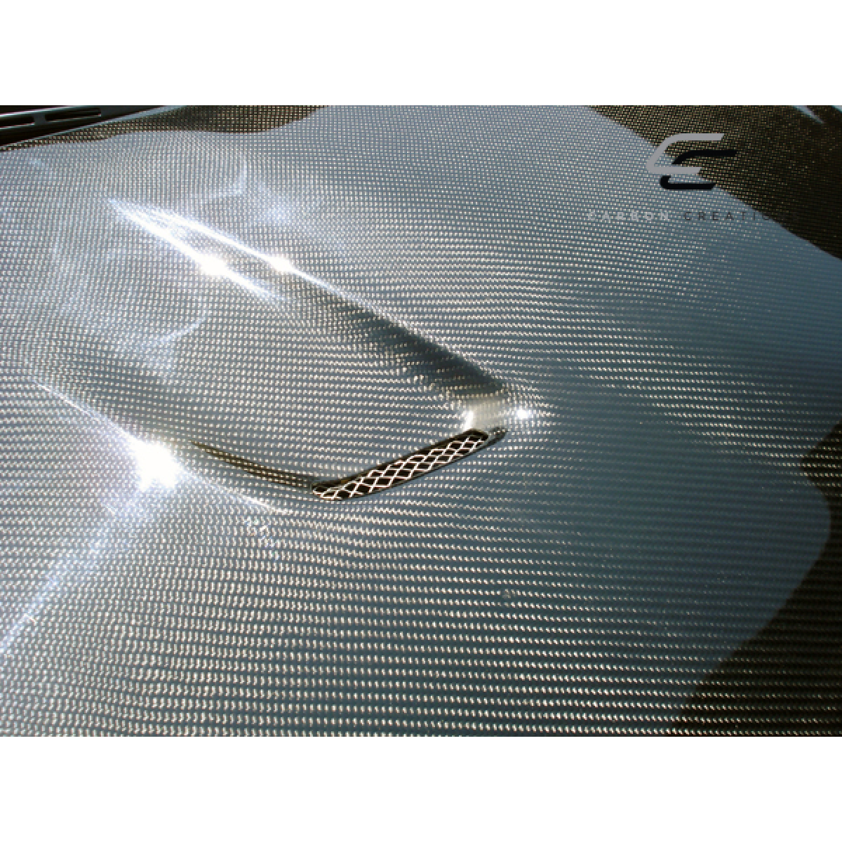 Modify your BMW 3-Series 2007 with our Exterior/Hoods - Top view of carbon fiber hood with vent