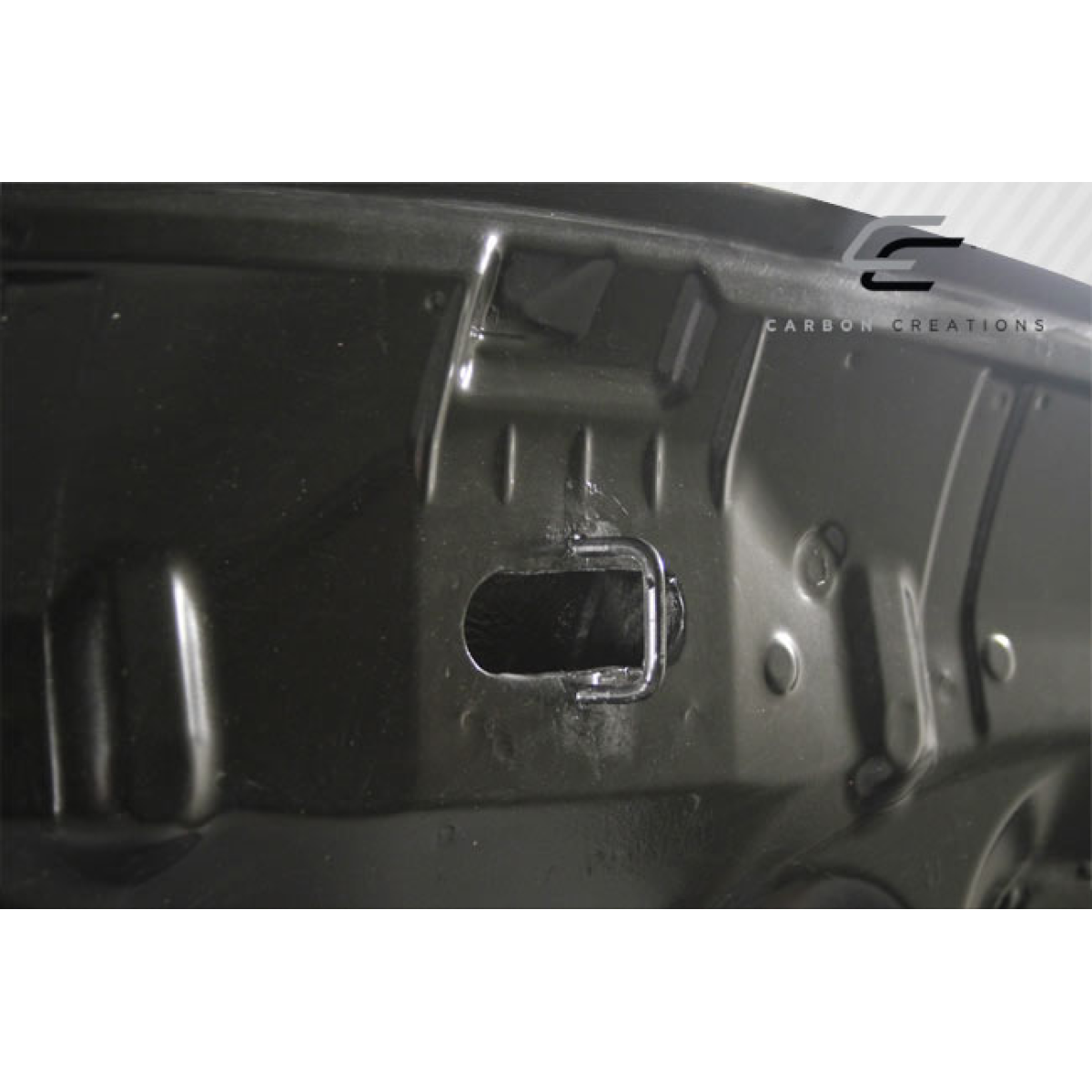 Modify your Honda Civic 2006 with our Exterior/Hoods - Close up view of hood attachment area