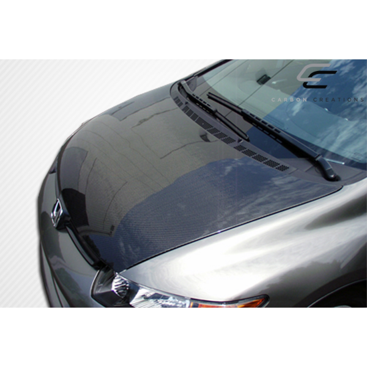 Modify your Honda Civic 2006 with our Exterior/Hoods - Viewed from a slight aerial angle on the hood