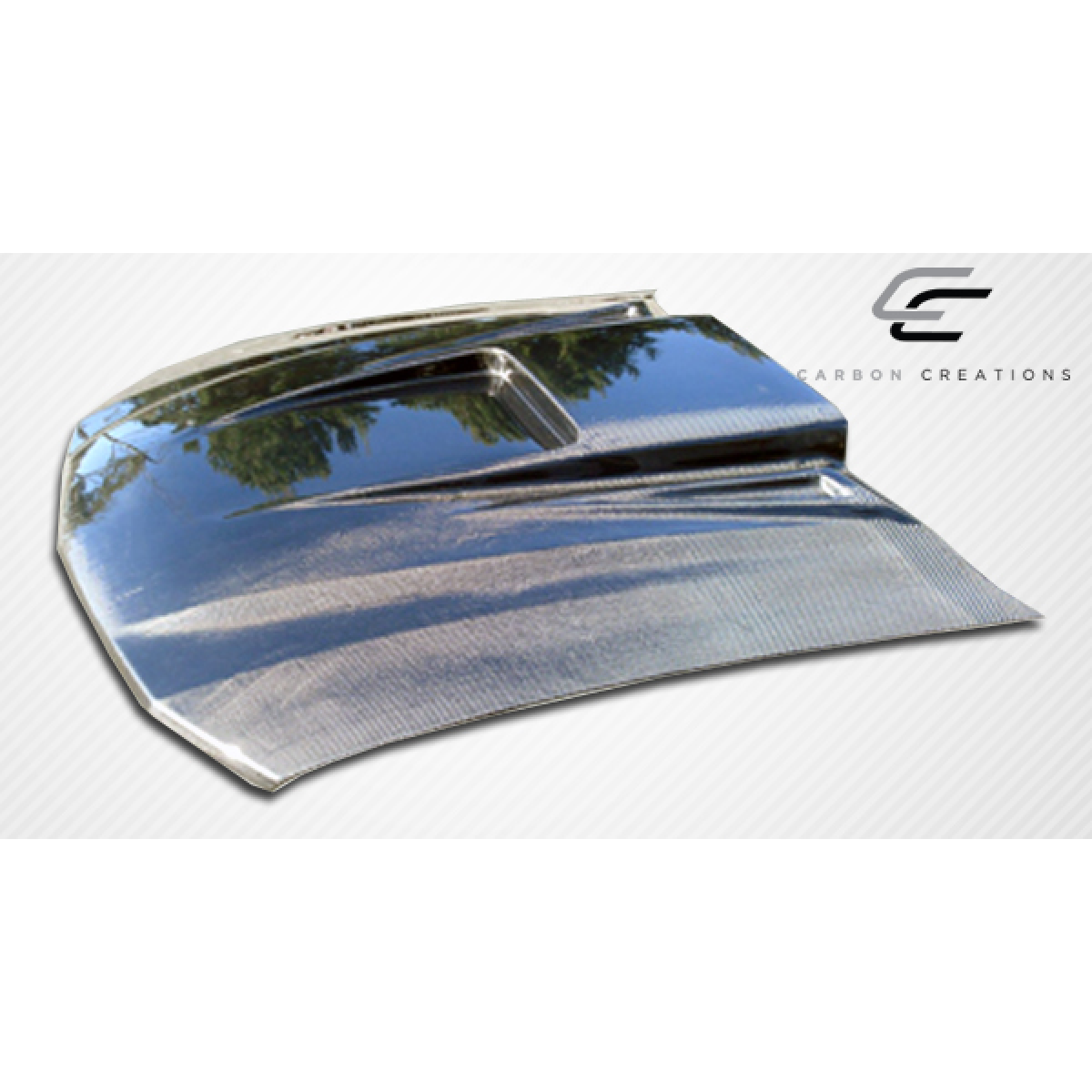 Modify your Ford Mustang 2005 with our Exterior/Hoods - Front angle view of the carbon fiber hood