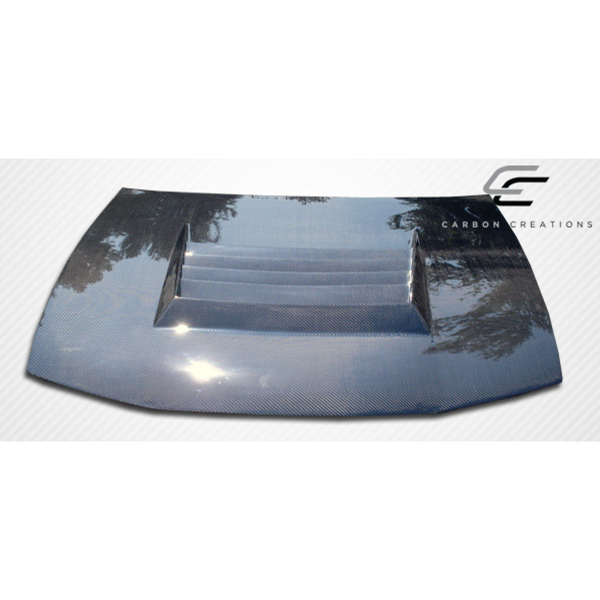 Modify your Nissan 240SX 1997 with our Exterior/Hoods - Angled top view of a carbon fiber hood