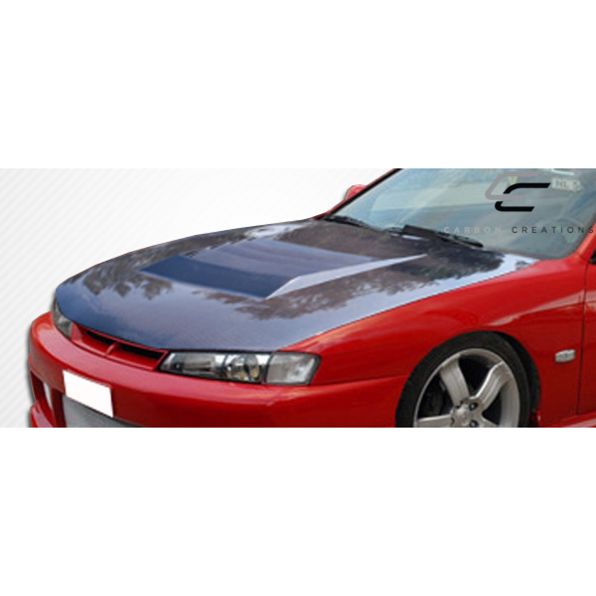 Modify your Nissan 240SX 1997 with our Exterior/Hoods - View from the front at a slight angle