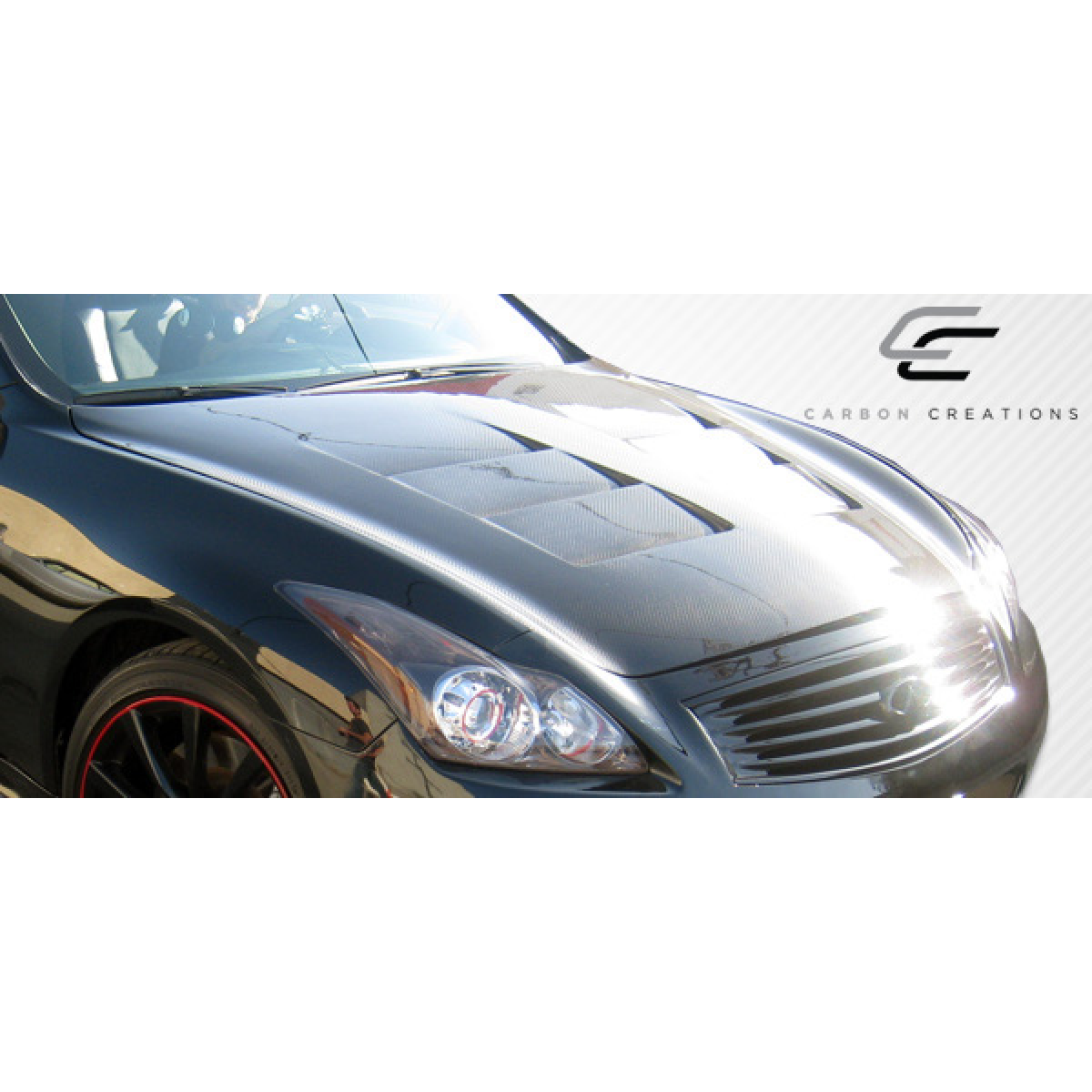 Modify your Infiniti G37 2008 with our Exterior/Hoods - Front angle view of carbon fiber hood