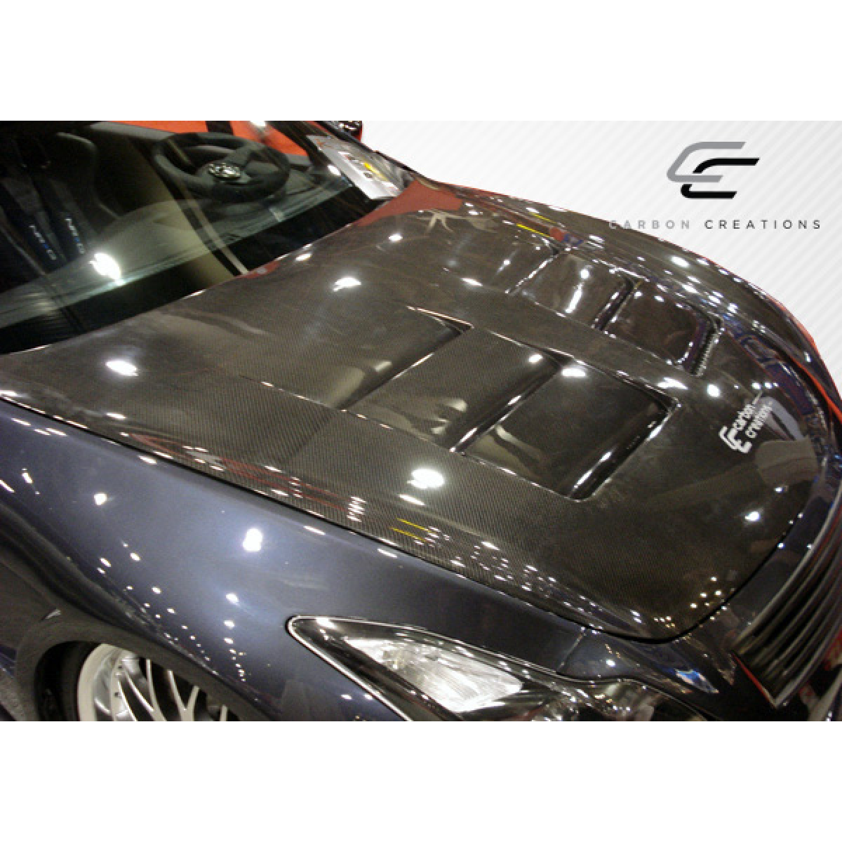 Modify your Infiniti G37 2008 with our Exterior/Hoods - The angle shows a top view of the car hood