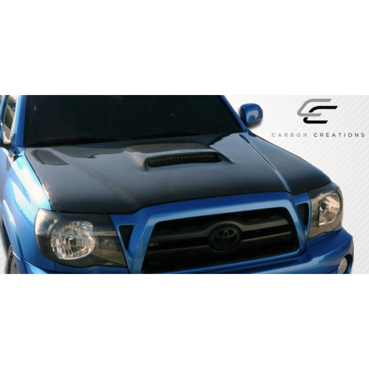 Modify your Toyota Tacoma 2005 with our Exterior/Hoods - Part viewed at an overhead angle