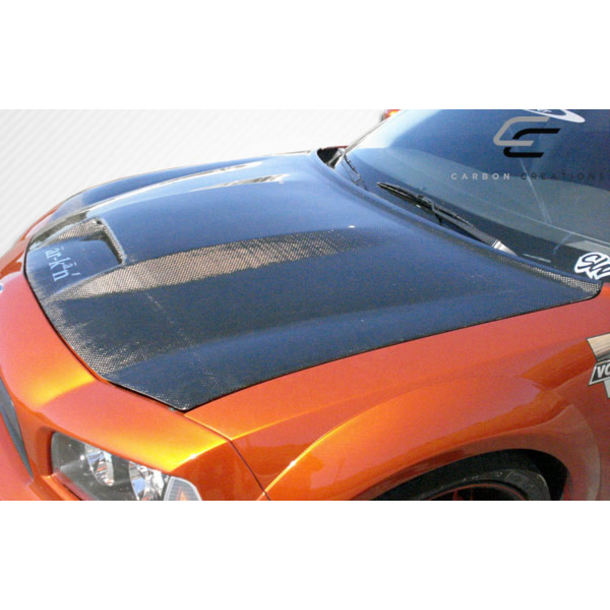 Modify your Dodge Charger 2006 with our Exterior/Hoods - Hood view from a slightly elevated angle
