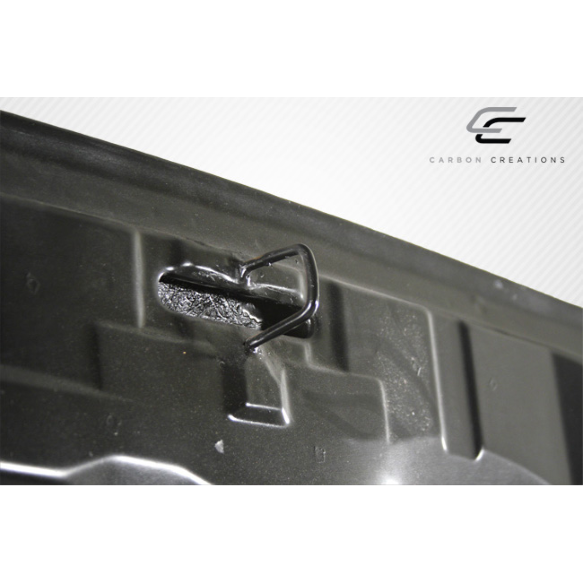 Modify your Mitsubishi Evolution 2008 with our Exterior/Hoods - Viewed from slightly above and to the side