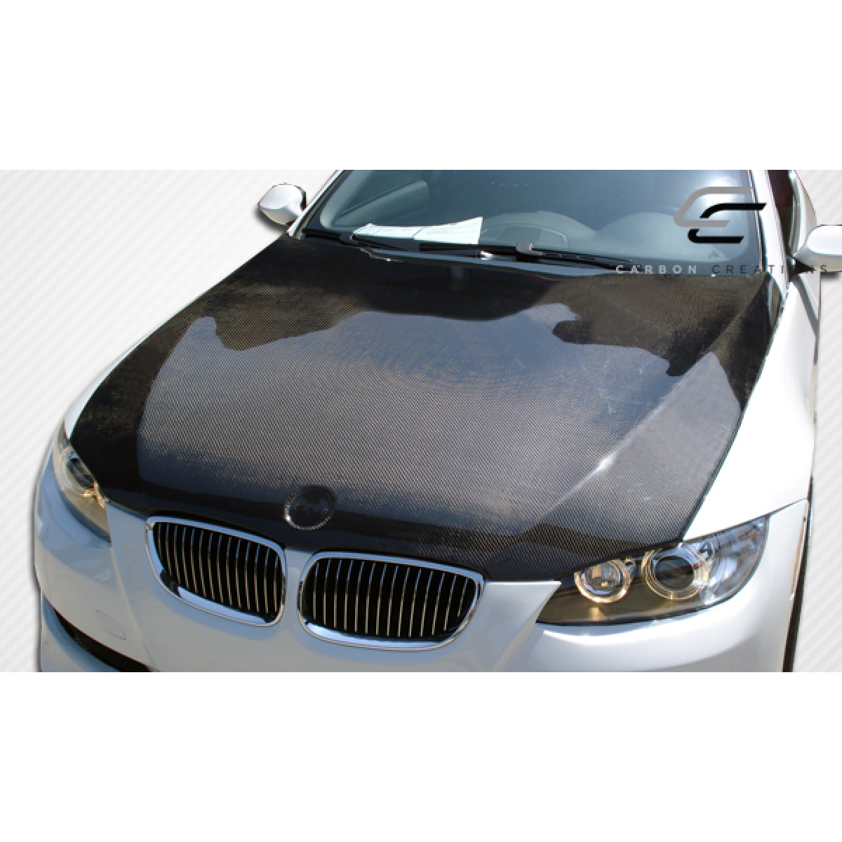 Modify your BMW 3-Series 2007 with our Exterior/Hoods - Top view of carbon fiber hood on BMW 3 Series