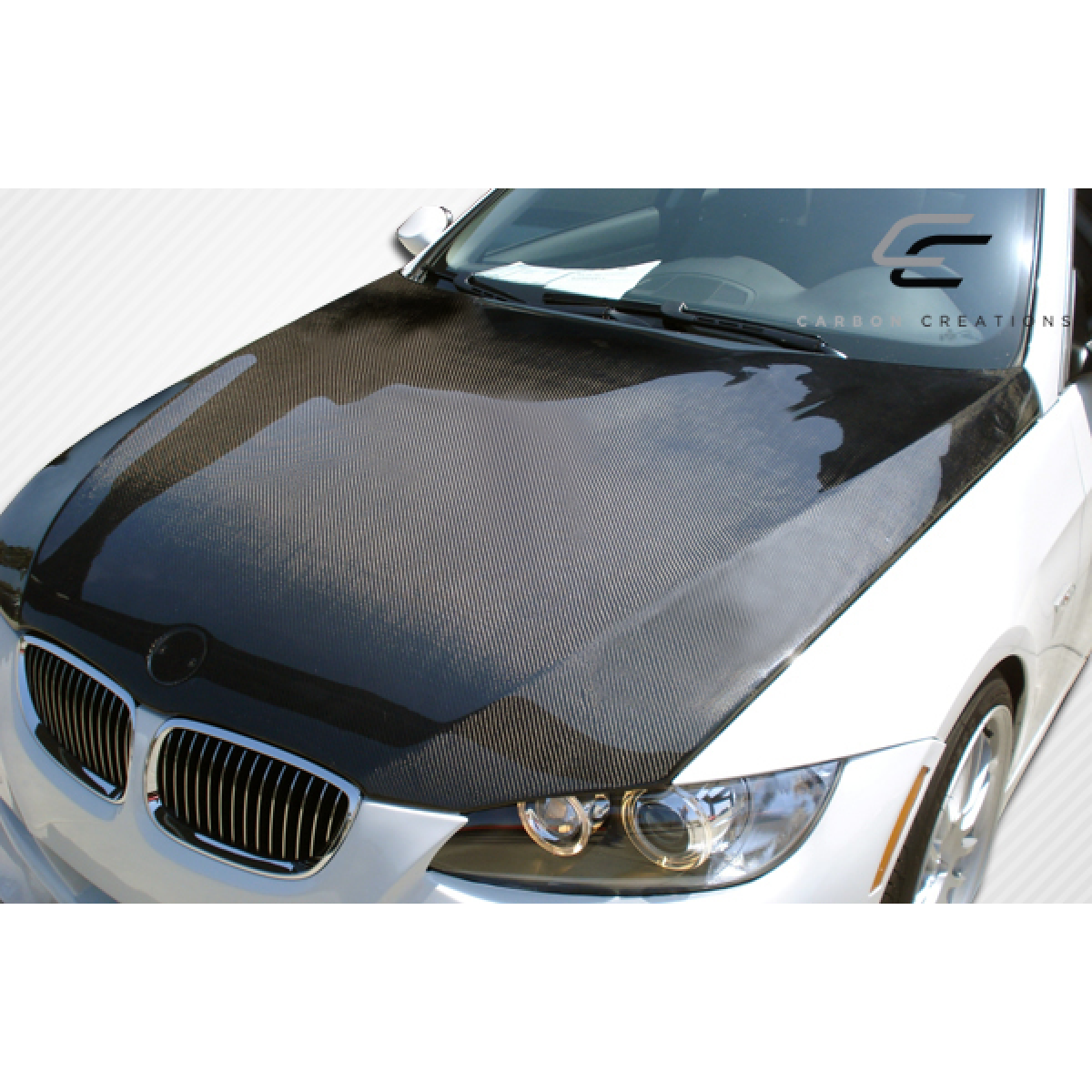 Modify your BMW 3-Series 2007 with our Exterior/Hoods - Viewed from slightly above and to the side