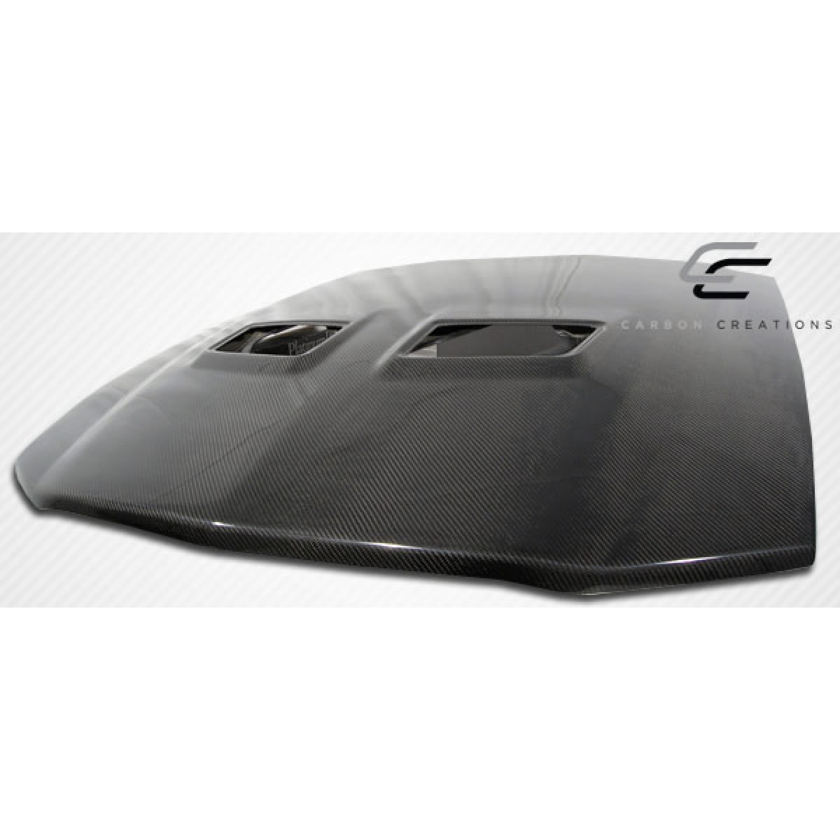 Modify your Ford Mustang 2005 with our Exterior/Hoods - Angled view showing carbon fiber hood design