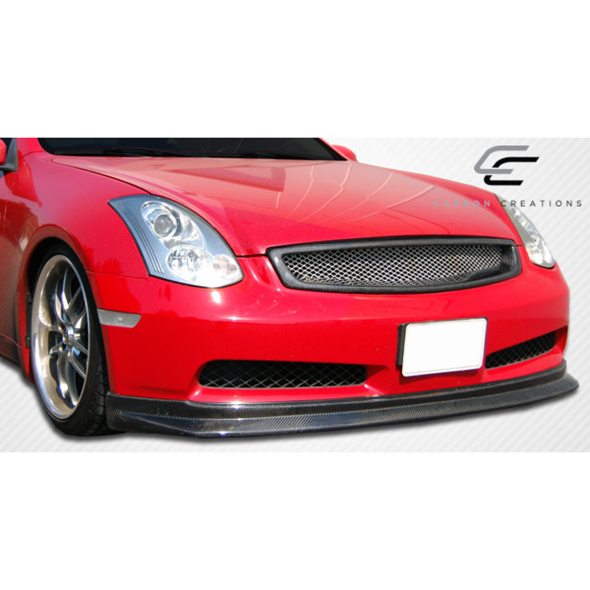 Modify your Infiniti G35 2003 with our Exterior/Front Lips - Front angle view of carbon fiber front lip